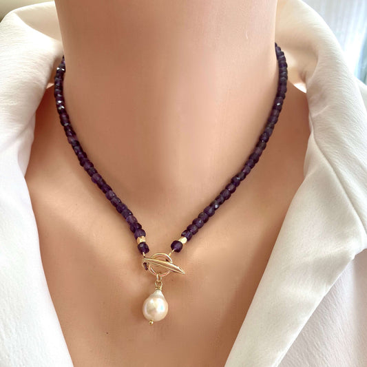Amethyst toggle necklace with baroque pearl charm showcasing faceted amethyst beads and elegant gold toggle clasp.