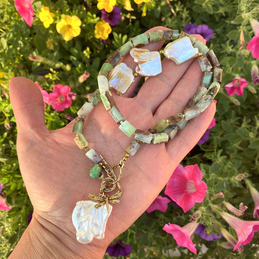 Chrysoprase necklace with dragonfly charm and baroque pearl, showcasing vibrant colors and artisan craftsmanship.