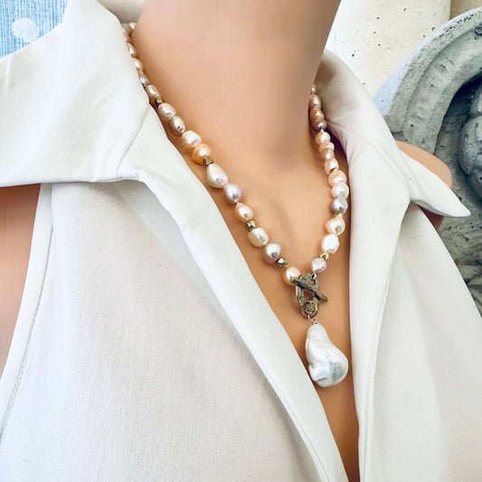 Pastel pearl necklace worn by mannequin side view highlighting gold bronze toggle clasp