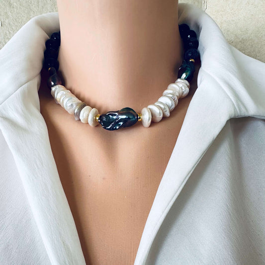 Baroque pearl necklace with purple amethyst beads and peacock black pearls worn at collarbone