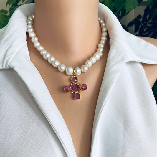 White potato pearl necklace with cross pendant showcasing white freshwater pearls and a pink gemstone cross centerpiece.