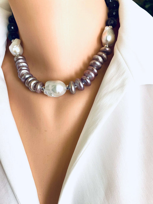 Amethyst pearl necklace featuring baroque and coin pearls on a mannequin in a stylish outfit.