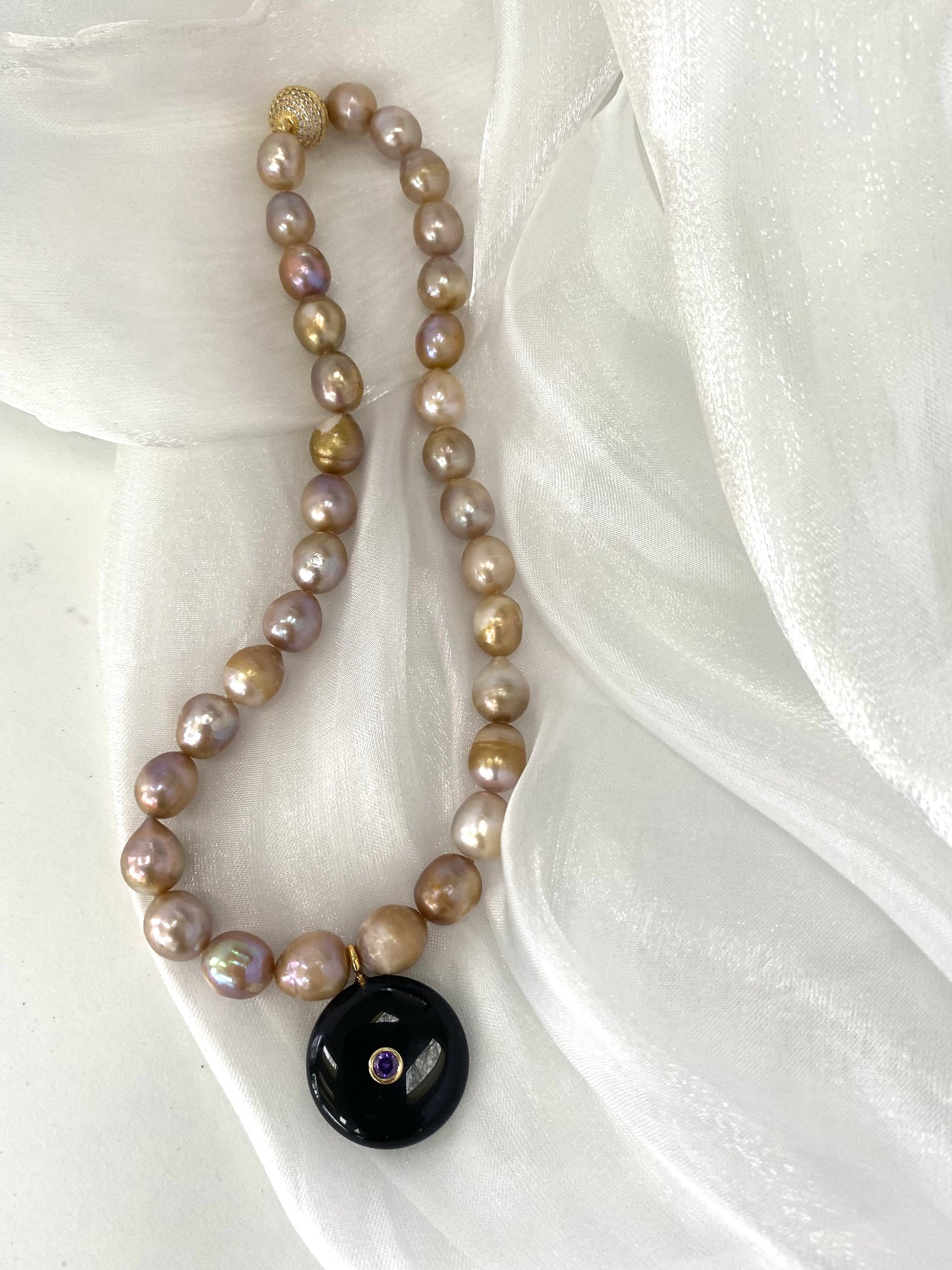 golden 10m rice pearl choker choker necklace on white sheet