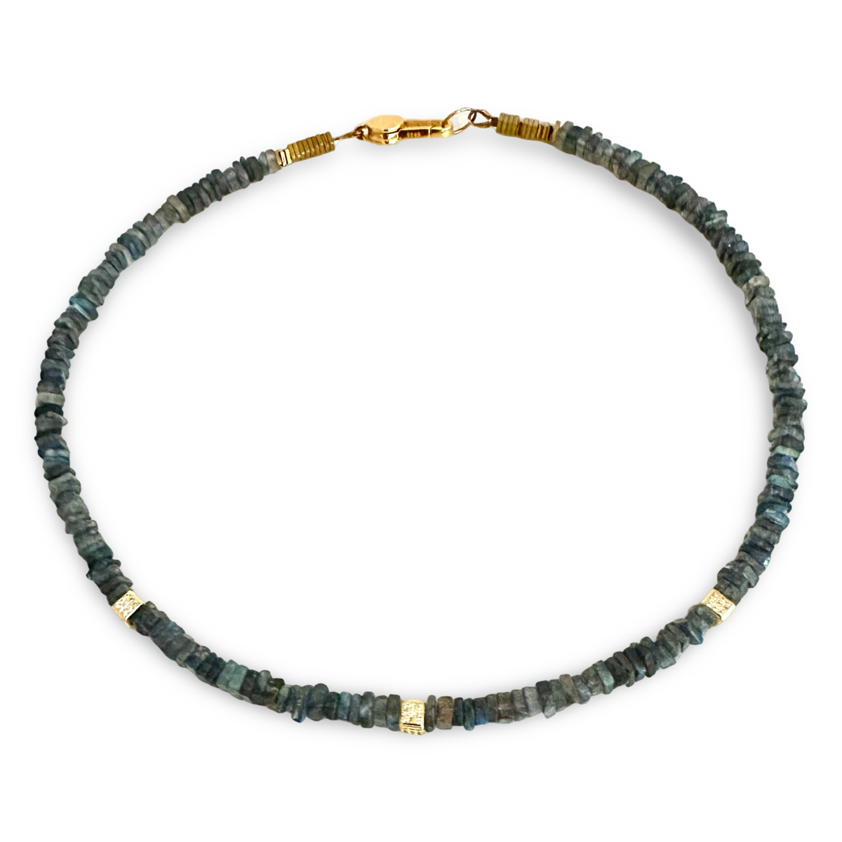 A beaded necklace made of small dark green and gray stone chips with gold spacer beads and a gold lobster clasp, shown on a plain white background.