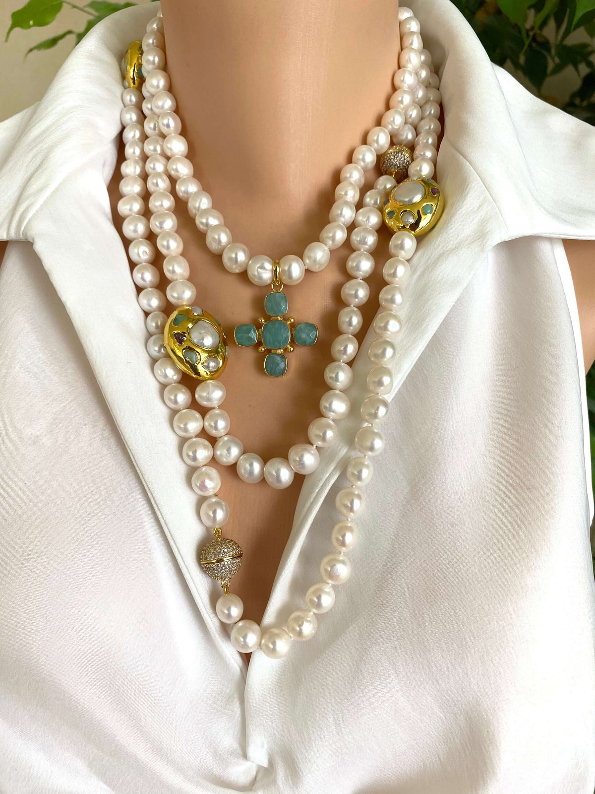 Potato pearl necklace with cross pendant showcasing luminous white freshwater pearls and gold plated Green Quartz cross.