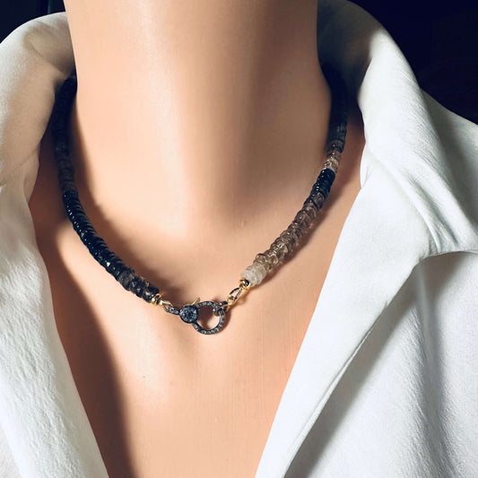 Smoky quartz necklace with pavé clasp showcased on a mannequin, featuring faceted beads and gold vermeil clasp.