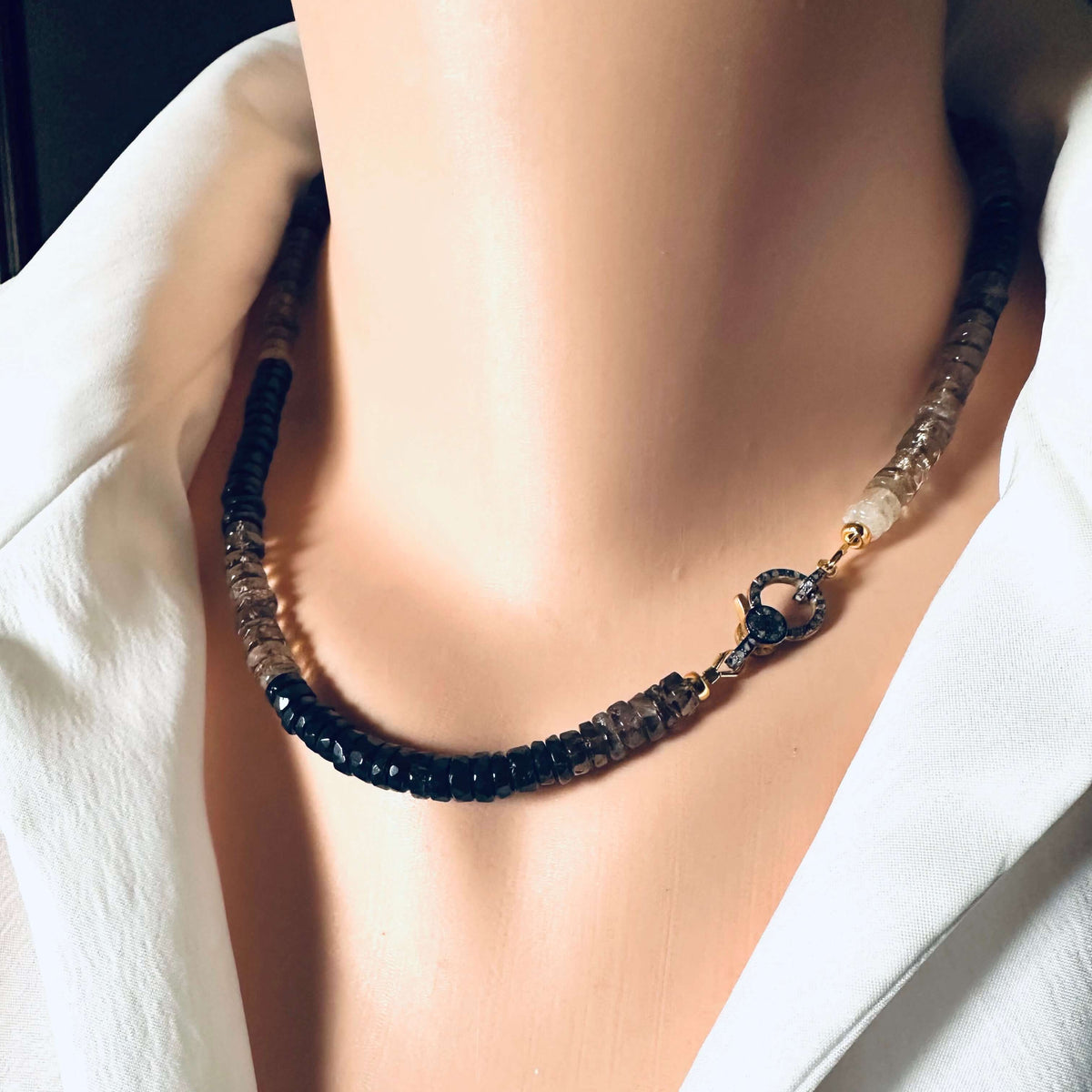 Smoky quartz necklace with pavé clasp showcases faceted beads and a gold vermeil clasp, 17.5 inches long.
