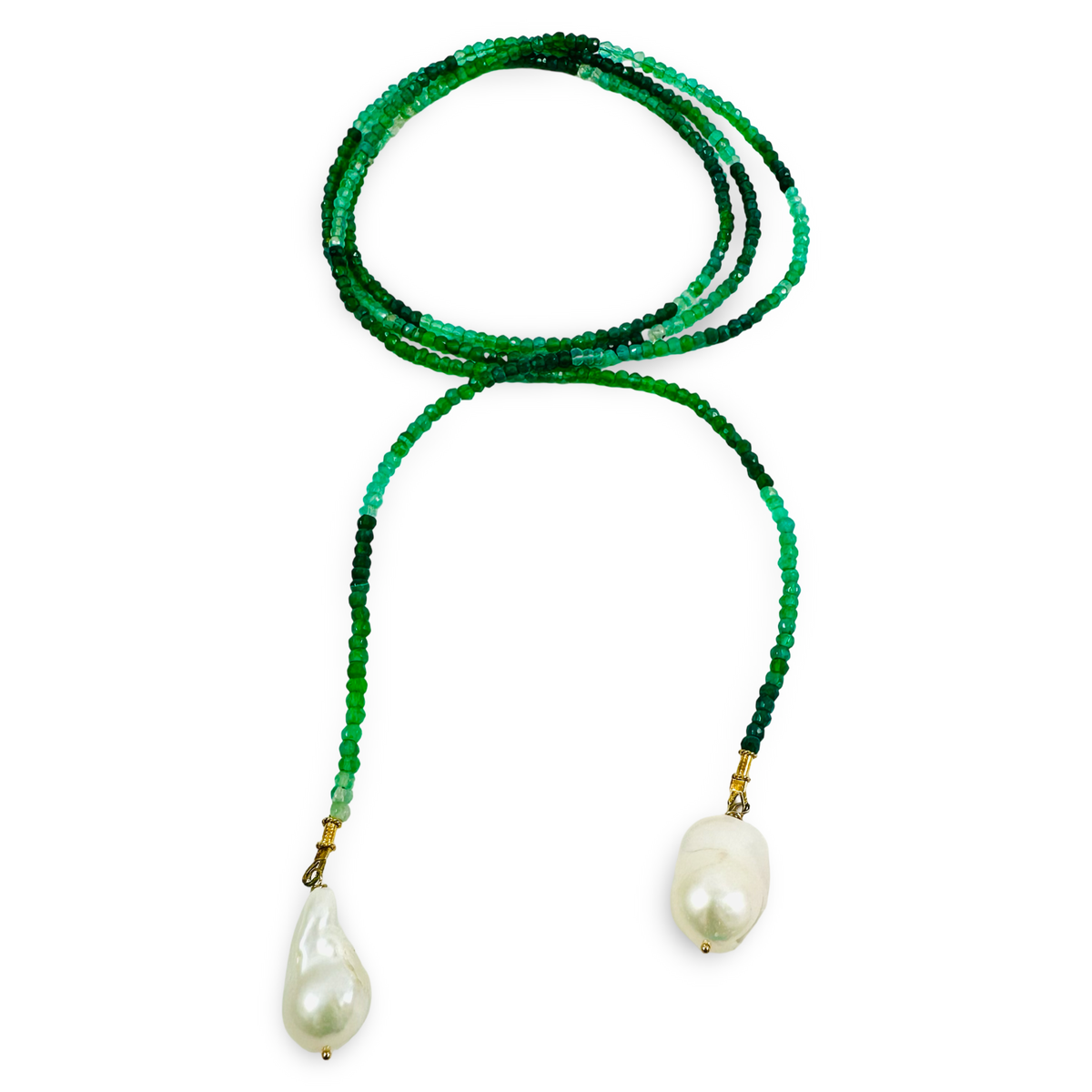 A beaded necklace featuring a gradient of green beads transitioning from dark to light, with two large, irregular white baroque pearls hanging from gold-toned clasps at the bottom.