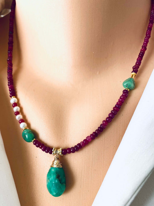 Chrysoprase ruby pearl necklace worn at the neckline with chrysoprase drop pendant and ruby beads