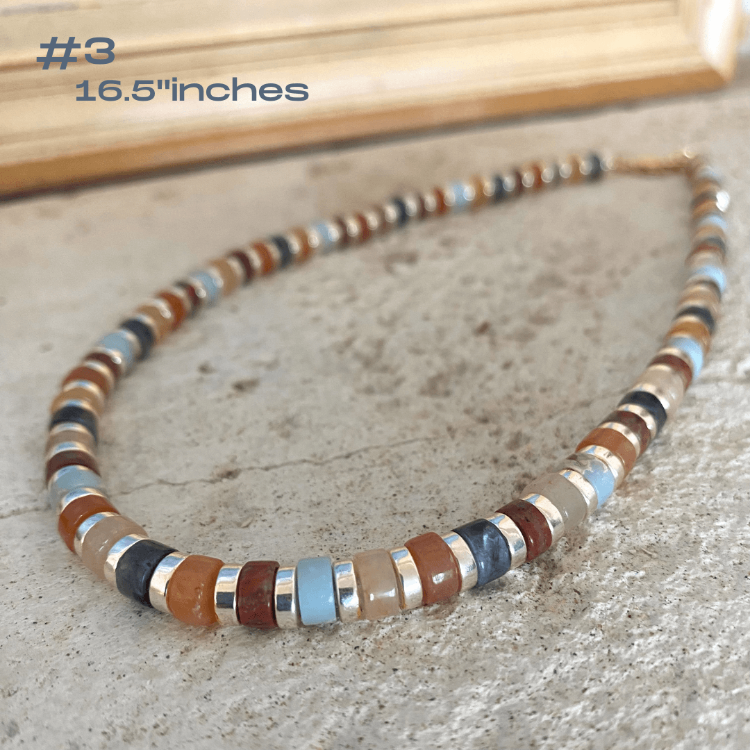 Gemstone choker necklace with multi color beads and hematite, measuring 16.5 inches, showcasing vibrant handcrafted design.