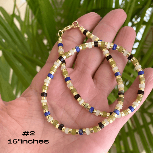 Gemstone choker necklace featuring multi-color beads and hematite, perfect for everyday style. Length: 16 inches.