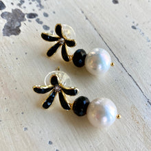Load image into Gallery viewer, Edison white pearl and black spinel drop earrings featuring black enamel and gold-plated flower studs. These elegant dangle earrings make a beautiful bridesmaid gift or a special present for her.