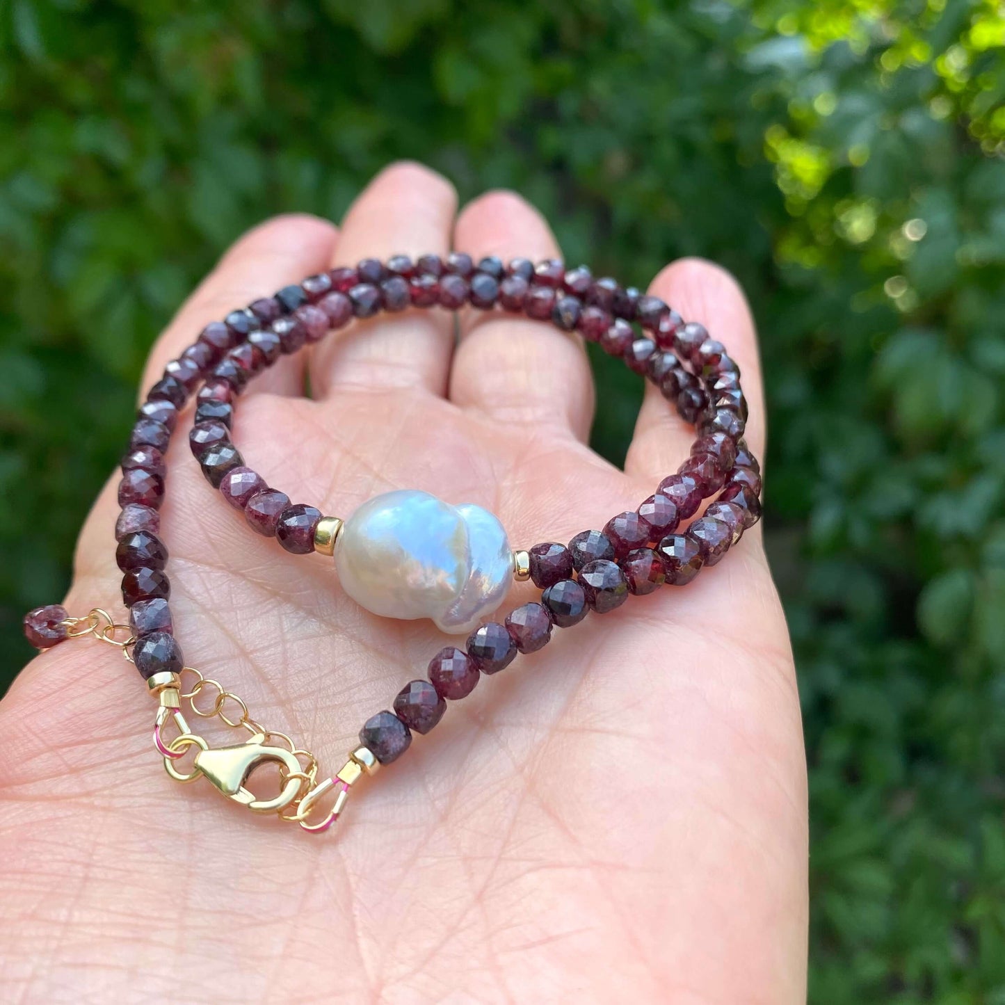Garnet pearl necklace handmade in Canada with faceted garnet cubes and baroque pearl