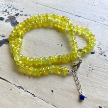 Load image into Gallery viewer, Embrace the light and lively vibes of summer with this stunning necklace, hand knotted yellow green faceted chalcedony rondelle beads 5.5-6mm. finished with silver lobster clasp and 1"inch long extender. This necklace measures 16.5"inches or 43cm