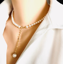 Carica l'immagine nel visualizzatore di Gallery, Classic Pearl Necklace, 15.5"inches, featuring lustrous freshwater white semi-round pearls and a delicate gold-filled heart chain extender of 7cm holding a 10mm round pearl charm