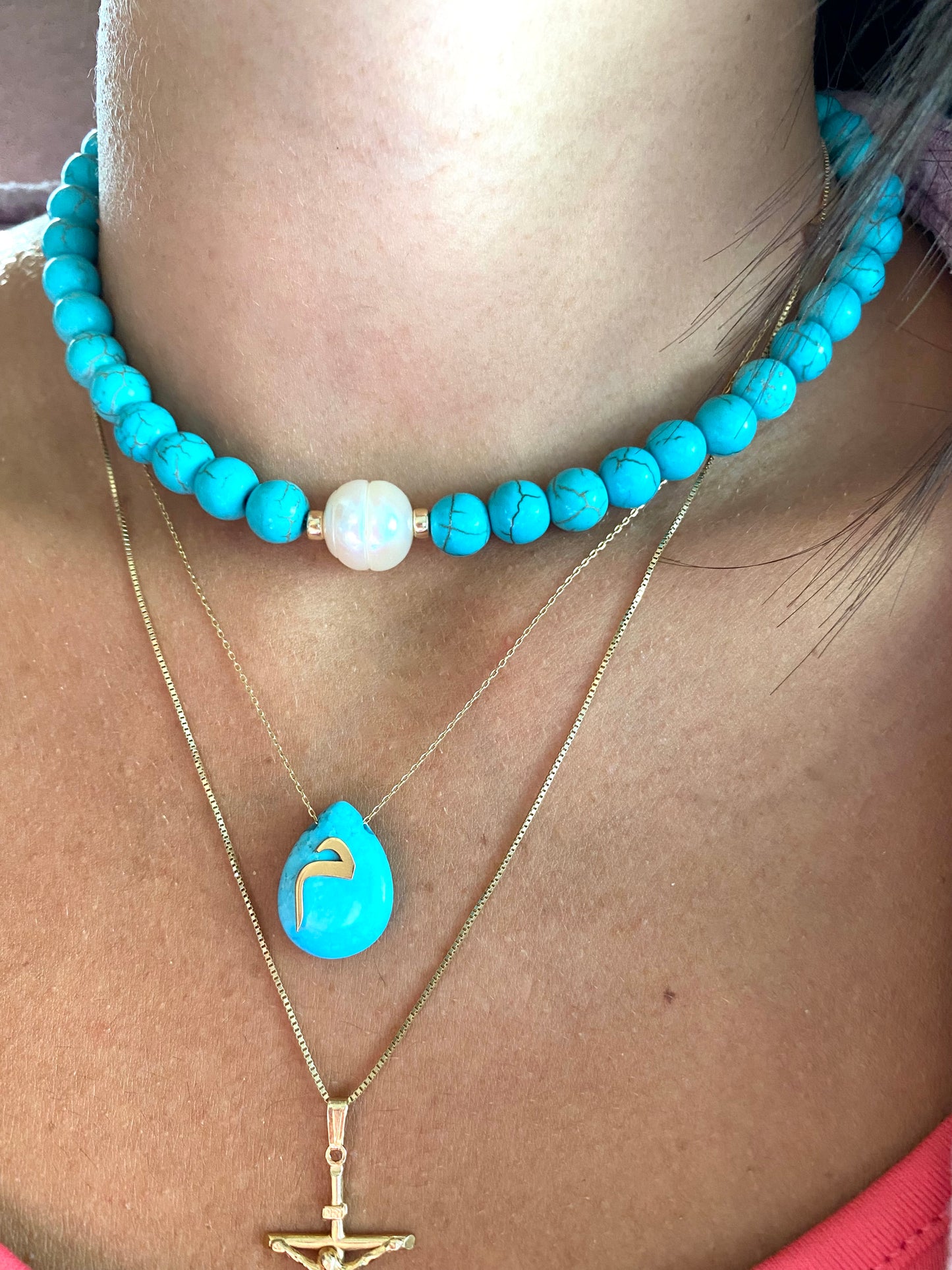 Turquoise howlite pearl choker necklace styled with pendant necklace for layered effect