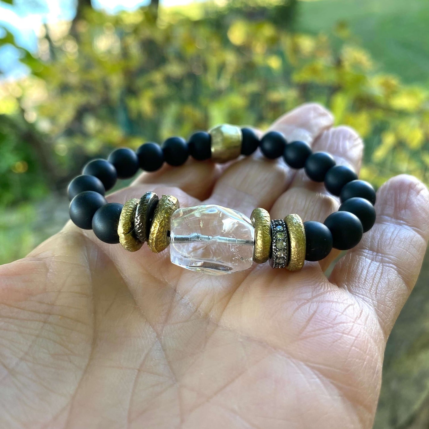 Crystal Quartz Onyx Bracelet featuring clear quartz and black onyx beads in a handmade design