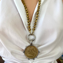 Load image into Gallery viewer, Elevate your style with this stunning Gold Faceted Hematite Beads 8mm and Repro Mexican Peso Coin Pendant Necklace. Featuring a unique Horse Coin Equestrian Pendant, this 28-inch hand-knotted necklace is the perfect piece to add to your collection.