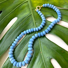 Carica l'immagine nel visualizzatore di Gallery, Graduated Oregon blue smooth opal candy necklace 8-11mm with gold vermeil plated sterling silver marine closure, measuring 18 or 19 inches. This modern opal jewelry piece features denim blue tones and is a perfect gift for her.