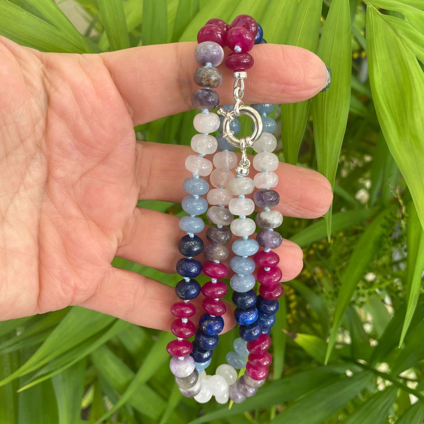 Denim candy necklace featuring lapis lazuli, rose quartz, and jade beads in a vibrant mix, perfect for bohemian style.