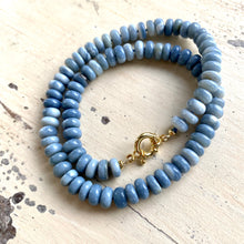 Carica l'immagine nel visualizzatore di Gallery, Graduated Oregon blue smooth opal candy necklace 8-11mm with gold vermeil plated sterling silver marine closure, measuring 18 or 19 inches. This modern opal jewelry piece features denim blue tones and is a perfect gift for her.