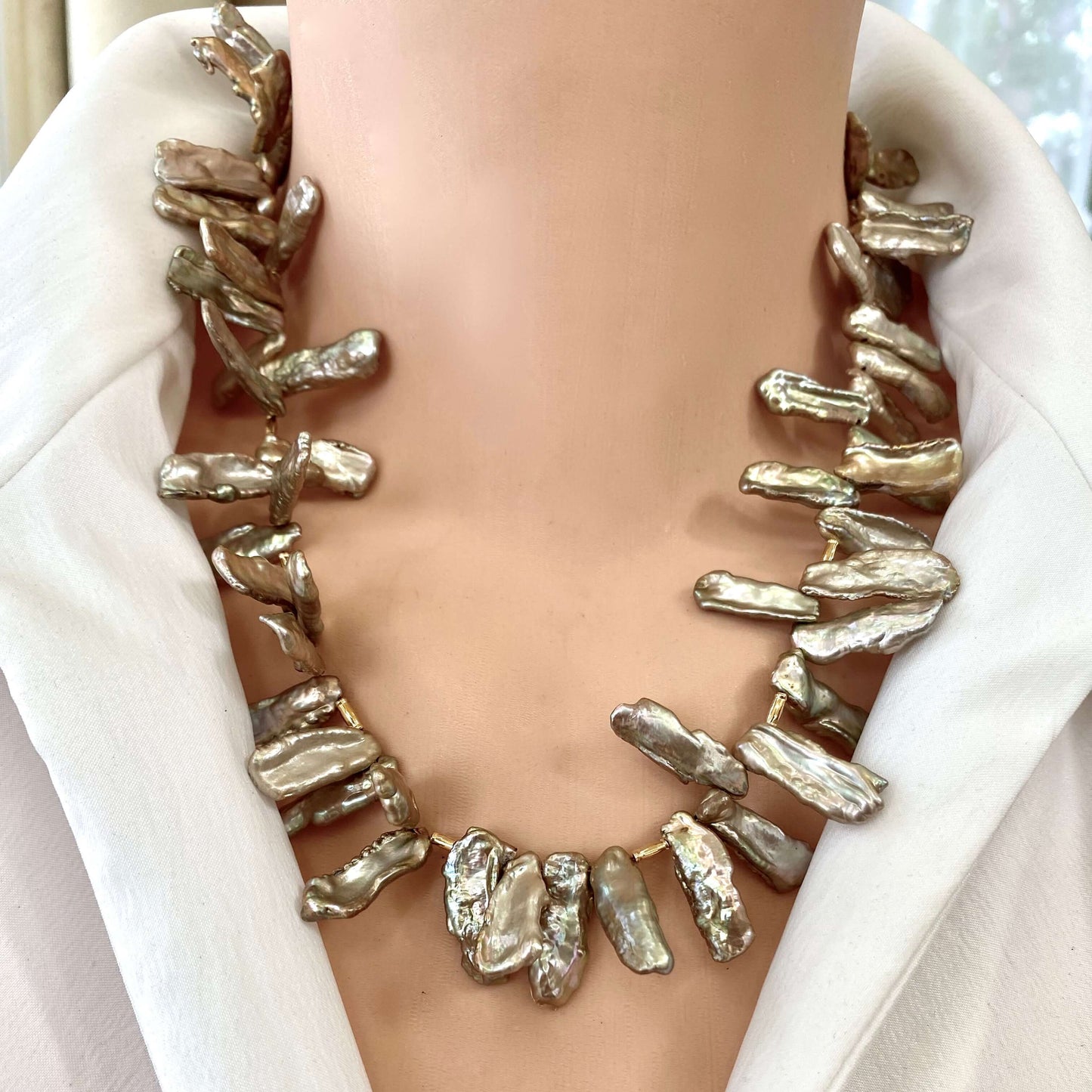 Champagne pearl necklace close-up worn, statement Biwa keshi pearls with bamboo-style gold details