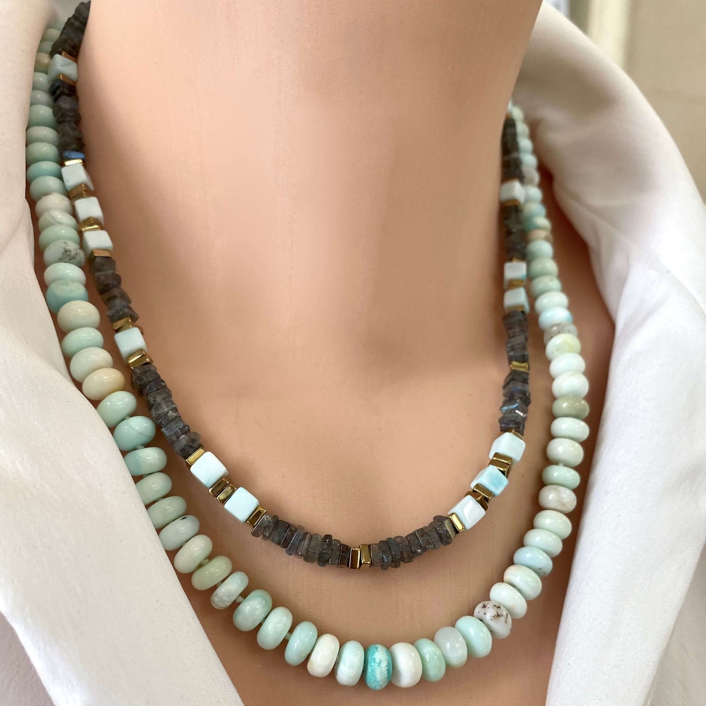 Labradorite and Blue Peru Opal Necklace layered on model, mixed labradorite and Peru opal bead necklace