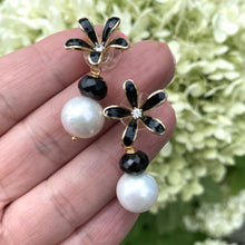 Load image into Gallery viewer, Edison white pearl and black spinel drop earrings featuring black enamel and gold-plated flower studs. These elegant dangle earrings make a beautiful bridesmaid gift or a special present for her.