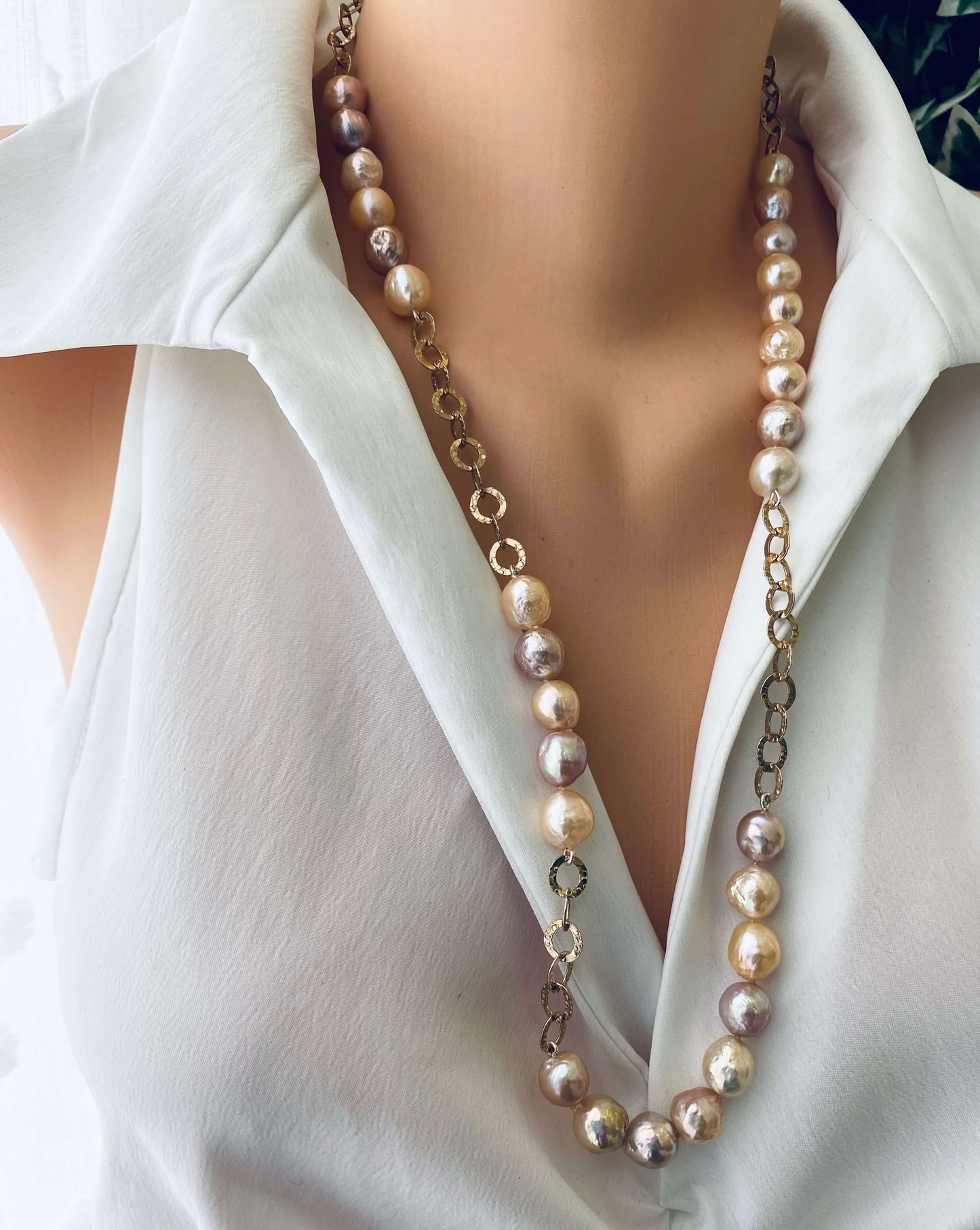 Edison pearl necklace featuring wrinkled pearls in rose gold, showcasing premium freshwater pearls' unique beauty.