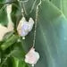 Mismatched Pearl Drop Earrings – Clear CZ, 14k Gold Filled, showcasing modern elegance with unique asymmetrical design.