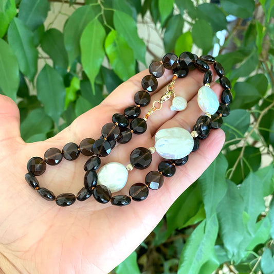 Smoky quartz pearl necklace with coin pearls showcasing earthy tones and elegant design.