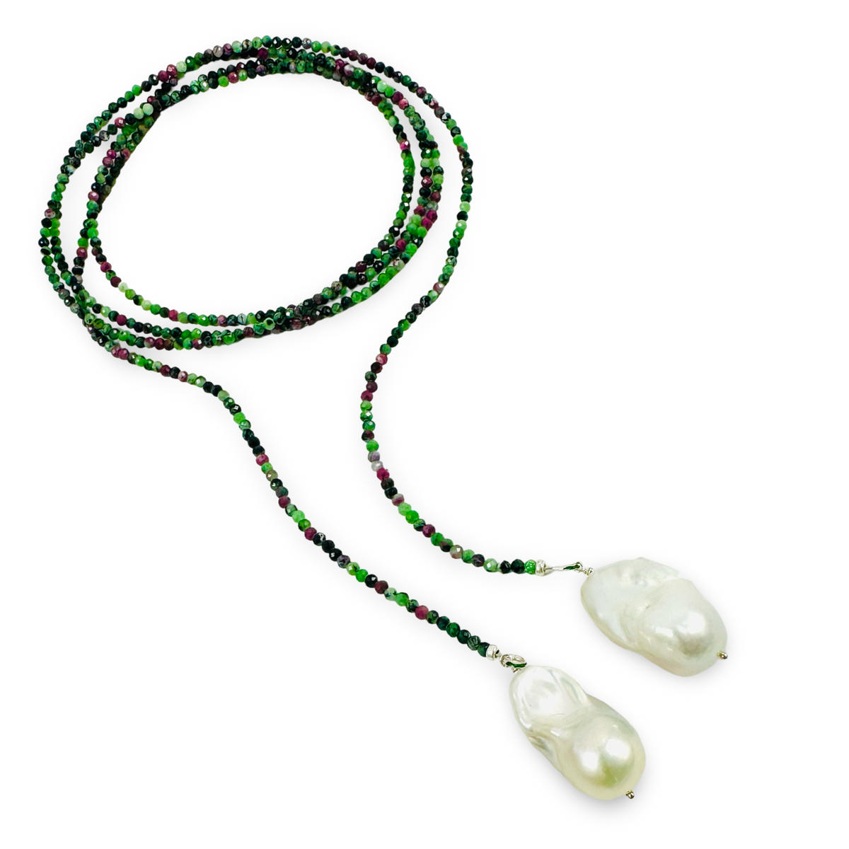 A 54inches -strand beaded necklace featuring vibrant green and dark purple beads, with two large, irregular white baroque pearls hanging at the ends, displayed on a clean white background.