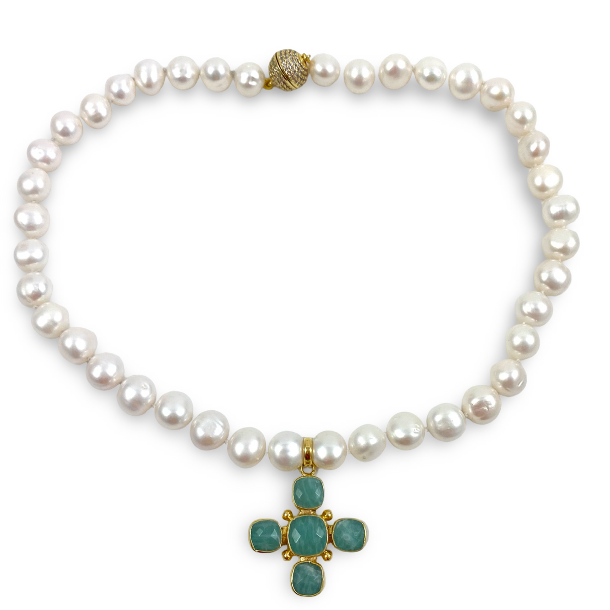 hand knotted 9–11mm white potato pearls, accented with a gold plated Green Amazonite Cross centerpiece and finished with a sparkling CZ pavé magnetic clasp.