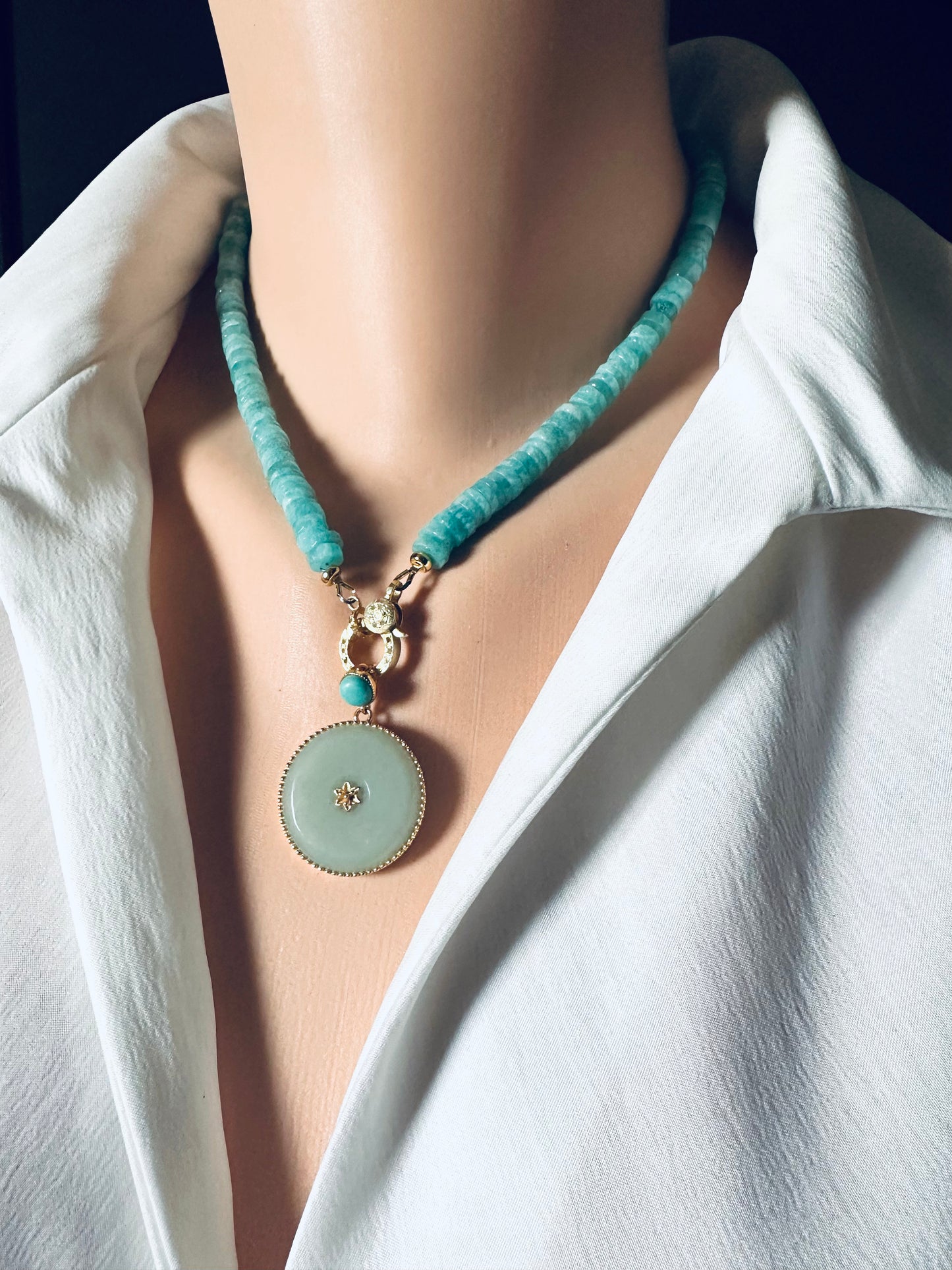 AMAZONITE necklace with a pendant on a mannequin wearing a white shirt.
