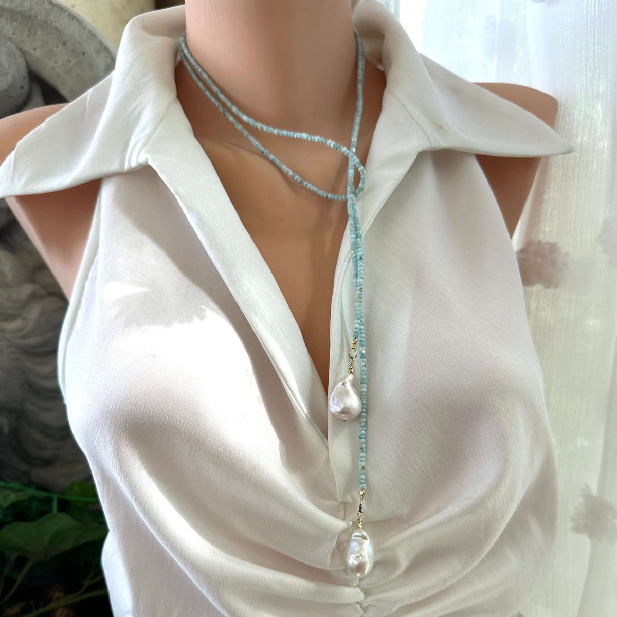 Blue Larimar Lariat Necklace on mannequin — handcrafted larimar and baroque pearl jewelry by Loulia Pearl Jewelry