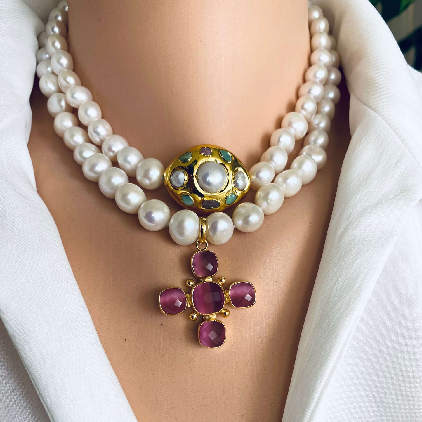 White potato pearl necklace with cross pendant showcasing luminous freshwater pearls and a decorative golden cross charm.