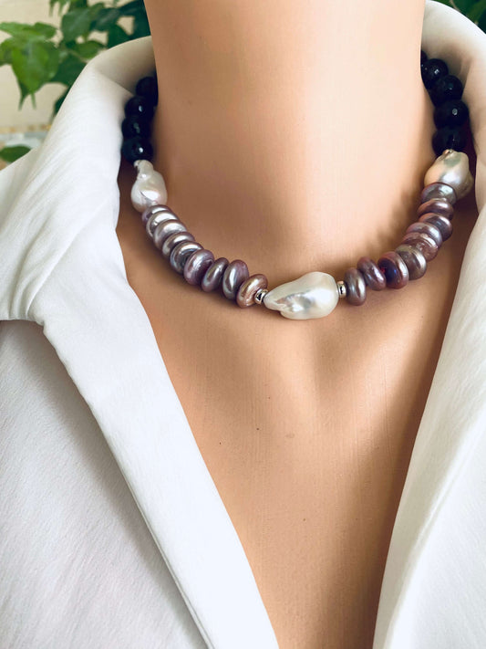Garnet pearl necklace featuring Baroque and Coin pearls, elegantly displayed on a mannequin against a stylish backdrop.