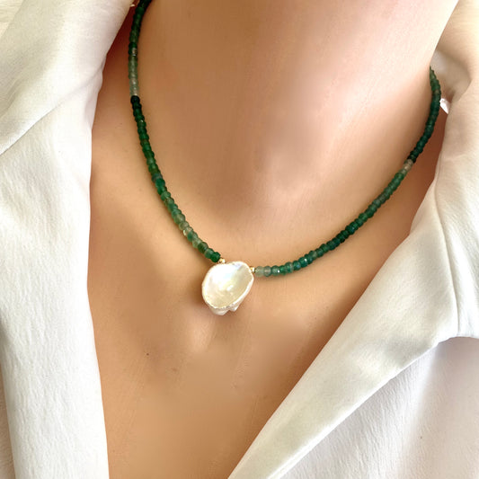Green onyx keshi pearl necklace worn on model with shaded green beads and central pearl