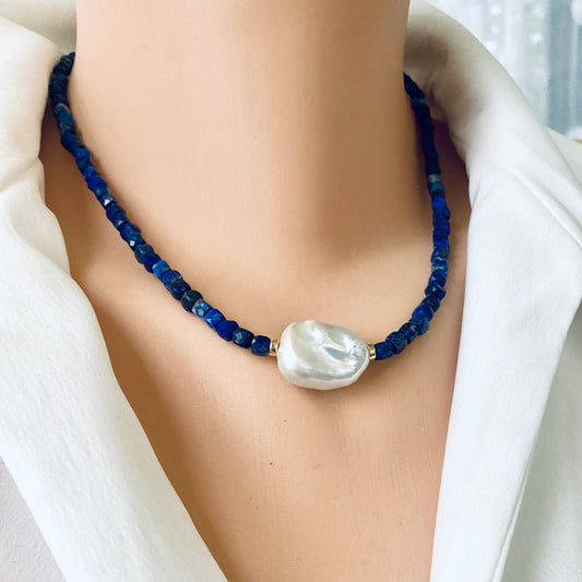 Delicate lapis lazuli baroque pearl necklace worn on model with faceted blue beads