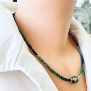 Stunning shaded  green Necklace featuring faceted Emerald roundelle beads and a greenish black Tahitian Pearl centerpiece. May birthstone Gift For Her. Crafted with gold filled, the necklace measures 18.5 inches in length