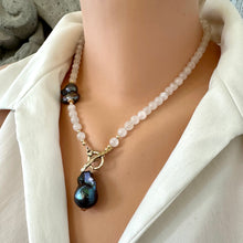 Carica l&#39;immagine nel visualizzatore di Gallery, White moonstone bead necklace with 6mm beads, featuring a side black peacock pearl and a baroque pearl pendant, accented with a gold bronze artisan toggle and gold-filled details. This 18-inch necklace is an elegant June birthstone gift for her.
