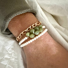 Load image into Gallery viewer, double wrap bracelet, featuring one long strand of lustrous freshwater pearls 4mm accented by stunning olive green Vesuvianite briolettes, gold filled details and lobster clasp
