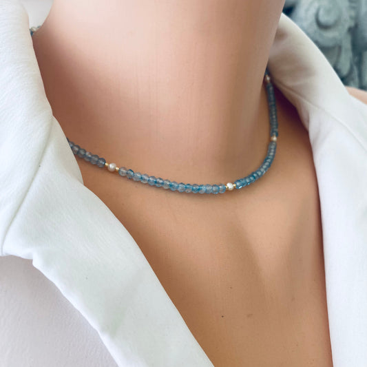 Blue topaz pearl choker necklace worn on mannequin, front view
