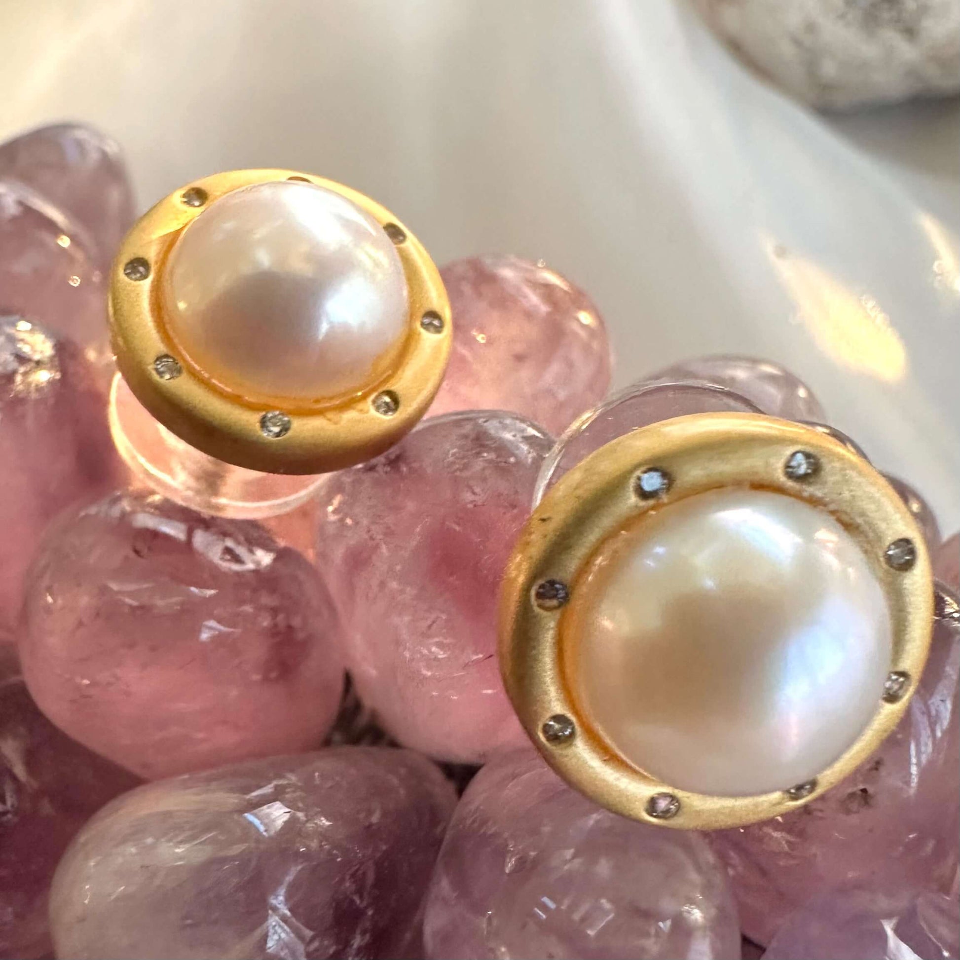 White Edison Mabe Pearl stud earrings with CZ accents in gold vermeil-plated silver, ideal for bridal jewelry and special occasions.