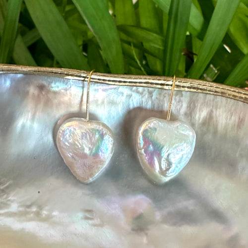 Heart-shaped freshwater pearl drop earrings, featuring 20mm pearls on gold vermeil-plated silver earring wires, perfect for bridal or romantic occasions.