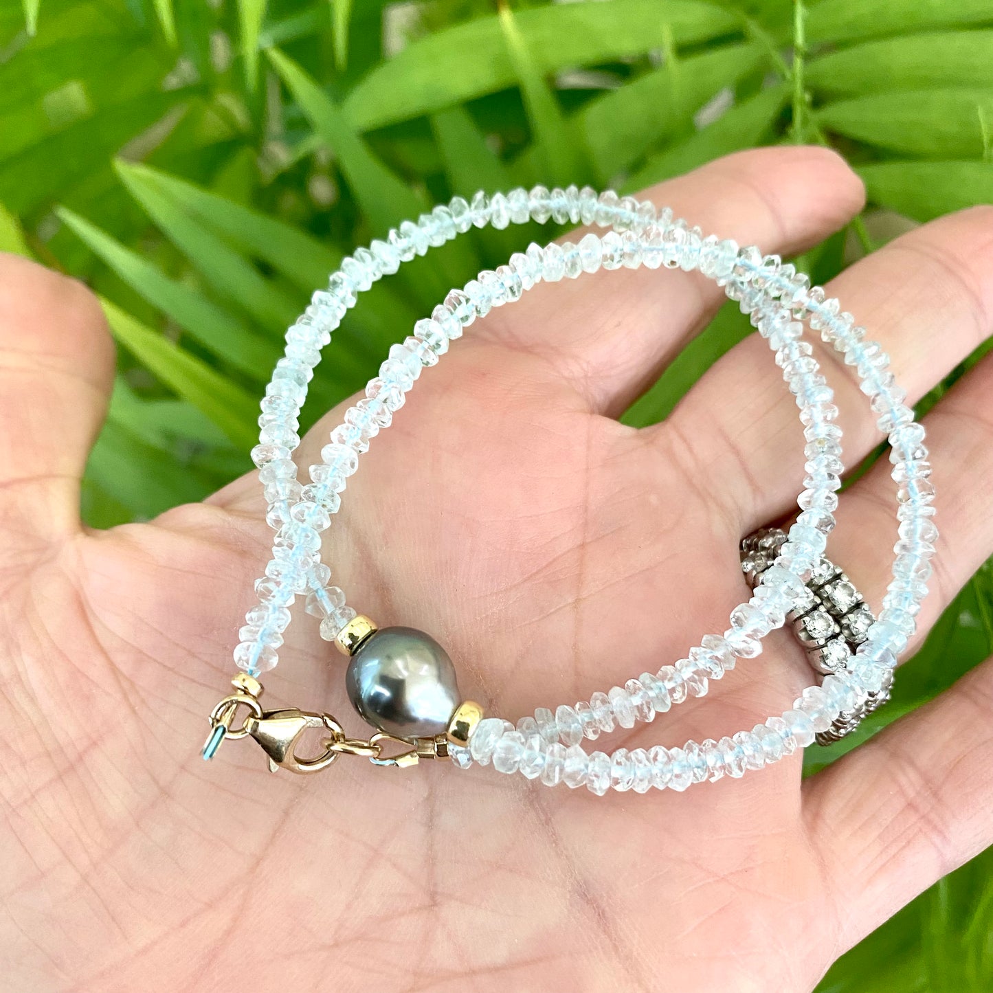 Aquamarine Tahitian Baroque Pearl Necklace | Choker Design featuring aquamarine rondelles and a Tahitian pearl.