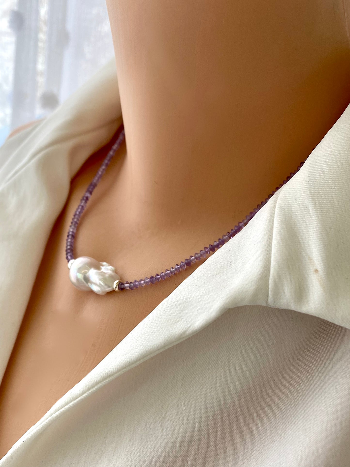 Lavender Amethyst Baroque Pearl Necklace featuring bicone Amethyst beads and a white Baroque pearl centerpiece.