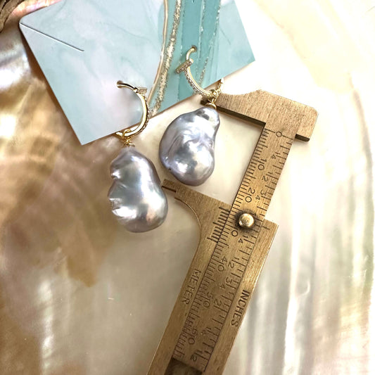 Grey baroque pearl hoop earrings pearl measured with ruler for size, handcrafted jewelry made in Canada.