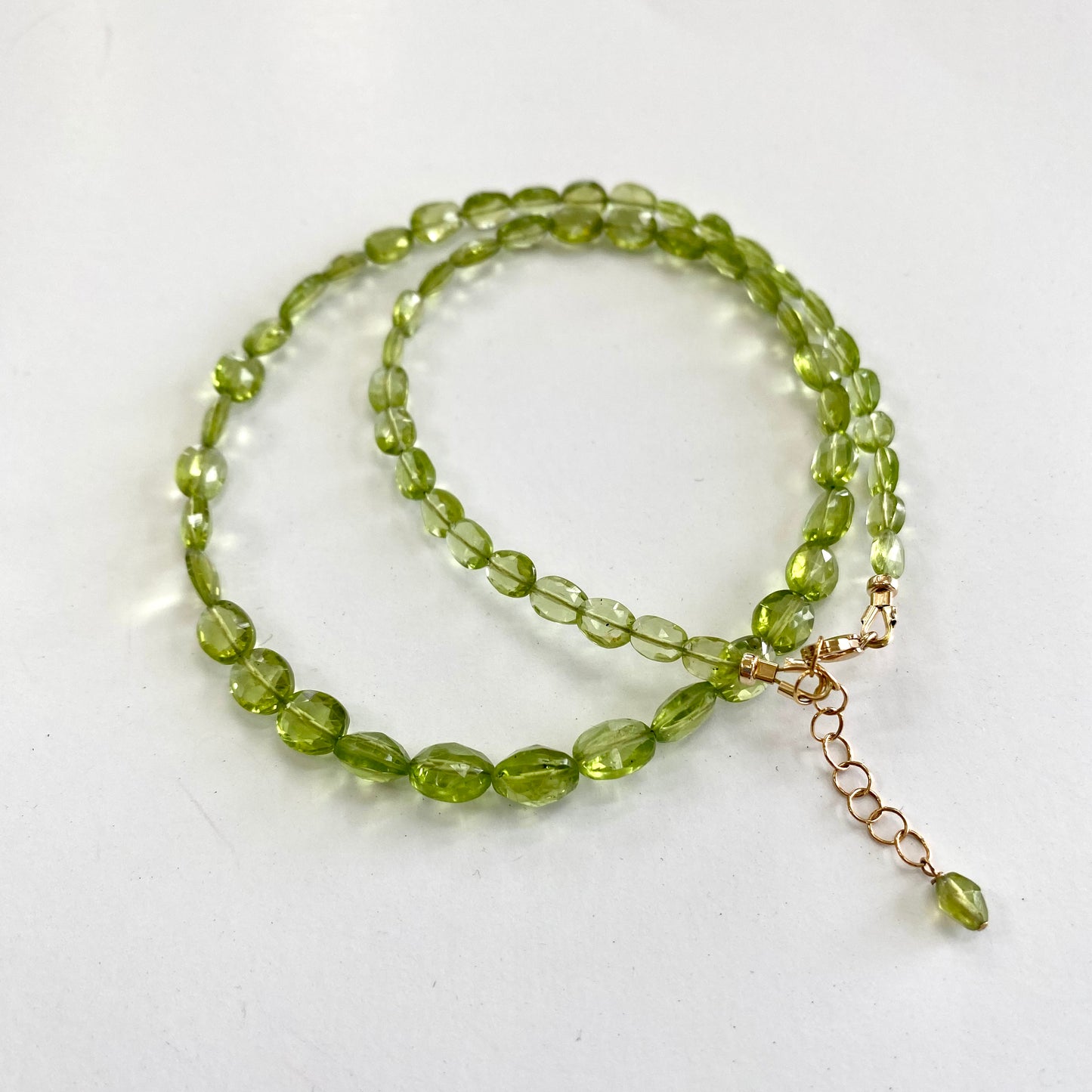 Peridot necklace 14K gold filled featuring delicate green peridot beads, handmade in Canada, showcasing spring-inspired elegance.