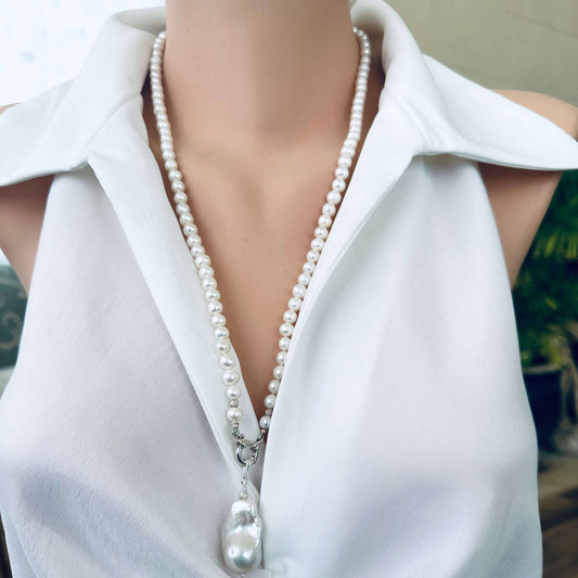 Front view of white pearl necklace with baroque pendant, classic handmade design